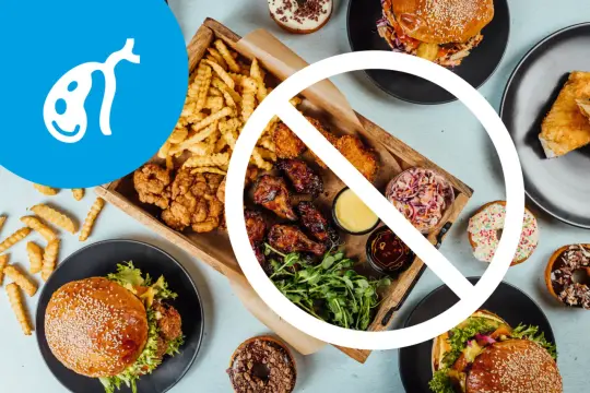 Symbol woreczka żółciowego i zakaz jedzenia fast foodów. Unikaj tłustych potraw, by zapobiec kamicy woreczka żółciowego.